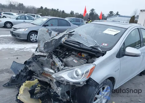 2015 Toyota Prius C Four from USA, damaged, VIN JTDKDTB37F1088893